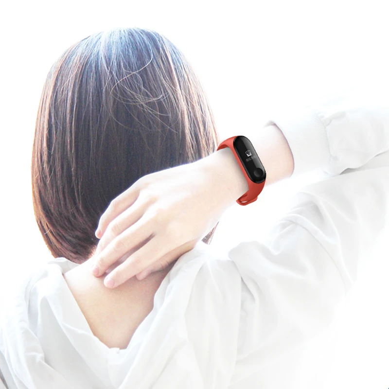 Montre intelligente au bras d'une femme