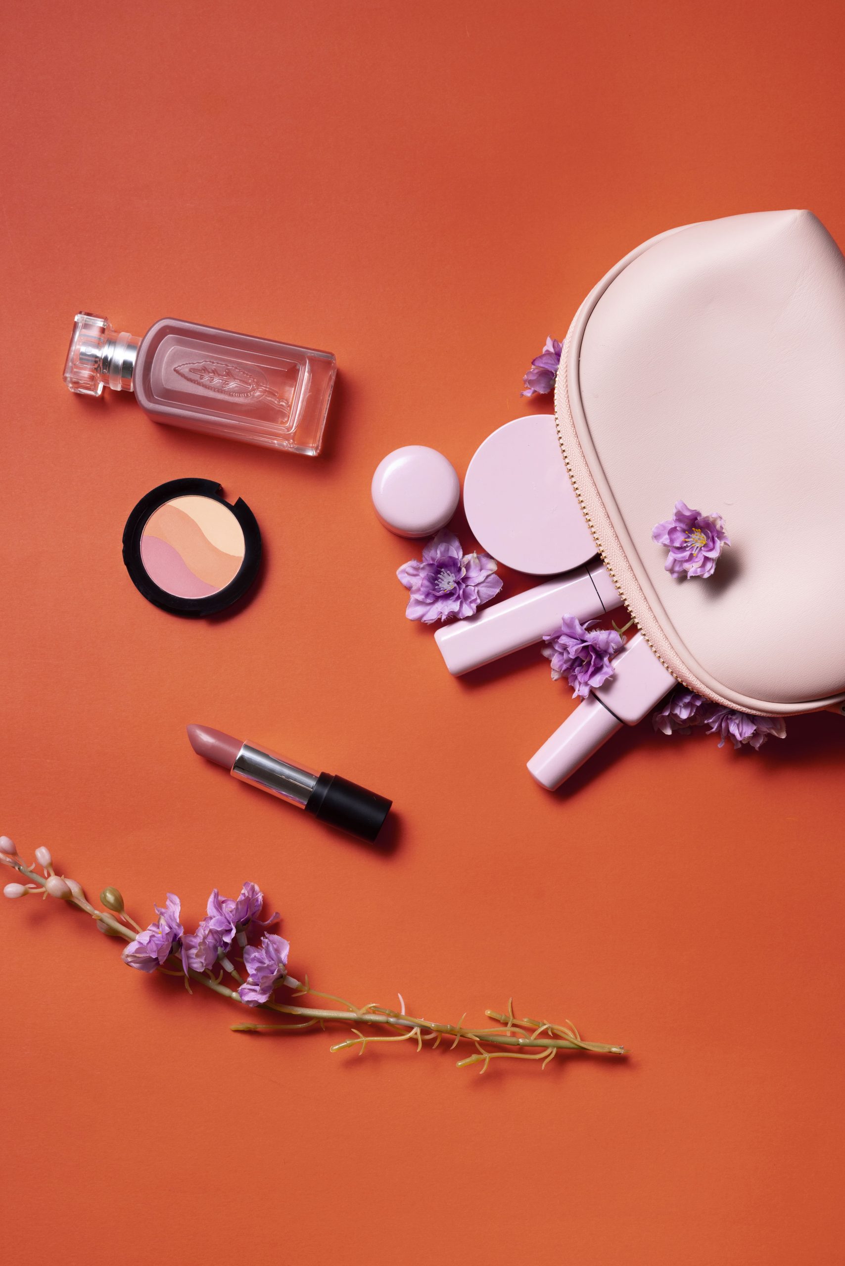 Top View Cosmetics Coral Background Min Scaled
