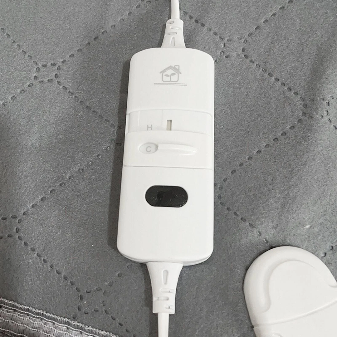 Télécommande de réglage de température d’une couverture chauffante